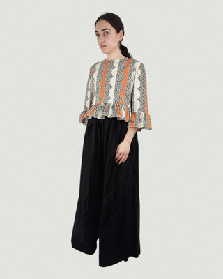 Abstract Cheetah Peplum Top